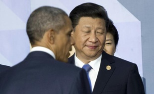 Le président américain Barack Obama (à gauche) et le président chinois Xi Jinping à Manille le 19 novembre 2015