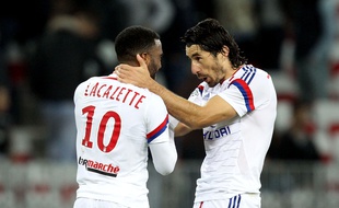 Alexandre Lacazette (L) and Milan Bisevac of Lyon jubilate after the third goal scoring by Lacazette during the French L1 soccer match between OGC Nice and O Lyon, on November 01, 2014 at the Allianz Riviera Stadium in Nice, southern France. FRANCE - 01/11/2014/BEBERT_0111_054/Credit:BEBERT BRUNO/SIPA/1411020930
