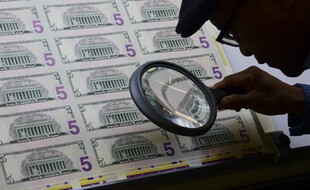 Des billets de 5 dollars (image d'illustration).