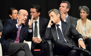 Alain Juppé et Nicolas Sarkozy à Limoges le 14 octobre 2015.