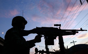 Un soldat thaïlandais déployé à Bangkok après l'instauration de la loi martiale, le 20 mai 2014.