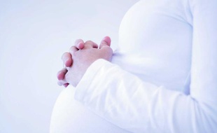 Illustration: Une femme enceinte.