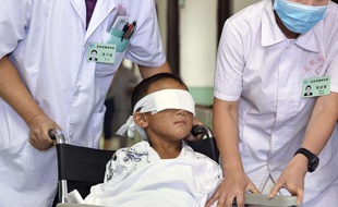 Guo Bin, l'enfant de 6 ans énucléé, le 30 août à l'hôpital de Taiyuan.
