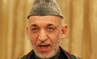 Karzai, réélu après le retrait d'Abdullah.