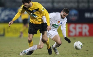 Quevilly (Nat) s'est qualifié pour les quarts de finale de la Coupe de France en battant mardi Orléans (Nat) 2-0 après prolongation et affrontera Marseille au prochain tour.