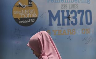 Un panneau accueillant des messages de condoléances pour les disparus du vol MH370, à Kuala Lumpur le 3 mars 2019.