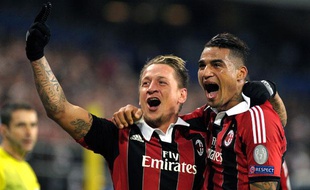 Philippe Mexès et Kevin-Prince Boateng lors d'un match du Milan AC le 21 novembre 2012.