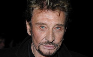 Johnny Hallyday à la soirée d'inauguration de l'exposition Bulgari au Grand Palais à Paris, le 9 décembre 2010