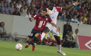 Marvin Martin (à gauche), face à l'AS Nancy-Lorraine, le 17 août 2012, au Grand Stade de Lille.