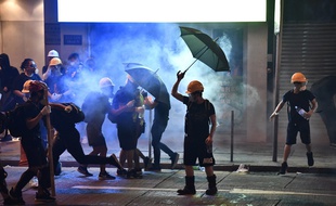 Des manifestants protestent contre une loi d'extradition controversée à Hong Kong, le 28 juillet 2019.