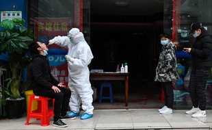 Des dépistages du Covid-19 en Chine