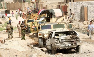 Deux kamikazes se sont fait exploserà Tal Afar (nord du pays), hier, faisant 34 morts.