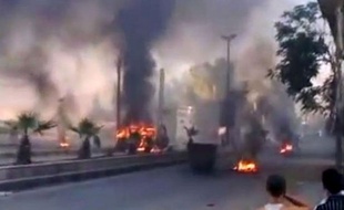 Des chars de l'armée syrienne ont pris d'assaut jeudi un quartier de Damas, le régime, qui a de nouveau échappé à des sanctions du Conseil de sécurité grâce à la Russie et à la Chine, affichant sa détermination à écraser la rébellion armée.