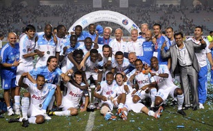 Les joueurs de Marseille, vainqueurs du Trophée des champions, le 28 juillet 2010 à Radès, en Tunisie.