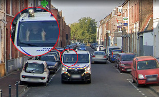 Un policier fait un geste obscène à la voiture Google à Roubaix.
