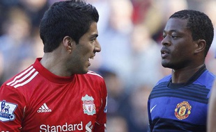Luis Suarez (à gauche) et Patrice Evra, le 16 octobre 2011, à Liverpool.