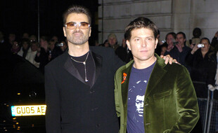 Le chanteur George Michael et son ancien compagnon Kenny Goss en 2005