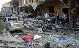 L'ancien quartier Syriac, l'un des secteurs tenus par le régime, après un bombardement rebelle le 11 juillet 2016 à Alep