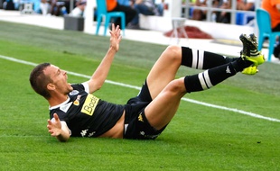 Angers' defender Romain Thomas reacts after scoring against Marseille, during the League One soccer match between Marseille and Angers, at the Velodrome Stadium, in Marseille, southern France, Sunday, Sept. 27, 2015. (AP Photo/Claude Paris)/MAR114/574586819100/1509271559