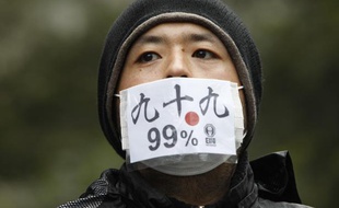 Un manifestant d'#Occupytokyo, à Tokyo, le 15 octobre 2011