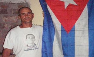 Le prisonnier cubain Wilmar Villar décédé jeudi et présenté comme un dissident mort des suites d'une grève de la faim par l'opposition - ce que le gouvernement a fermement démenti - a été enterré vendredi à Contramaestre, dans l'est de Cuba, au milieu de fortes mesures de sécurité.