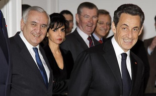 Jean-Pierre Raffarin et Nicolas Sarkozy, le 18 mars 2011, à Paris.