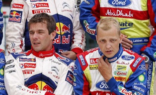 Sébastien Loeb et le Finlandais Mikko Hirvonen, ici au Portugal en mai 2010, sont coéquipiers dans l'écurie Citroën Rallye en 2012.