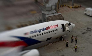 Un avion de Malaysia Airlines sur le tarmac de l'aéroport international de Kuala Lumpur le 16 juin 2014