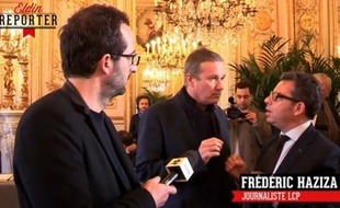 Capture d'écran d'un reportage de Canal +, qui a filmé un vif échange entre Frédéric Haziza et Nicolas Dupont-Aignan.