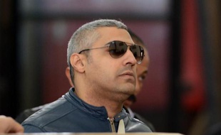Le journaliste canadien Mohamed Fahmy à son arrivée au tribunal le 12 février 2015 au Caire