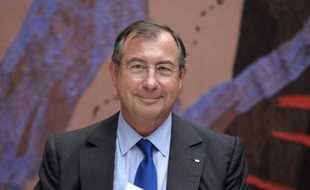 French Group Bouygues Chairman Martin Bouygues poses prior to his hearing by the Commission of Economic Affairs of the French National Assembly, in Paris on July 1, 2014. AFP PHOTO ERIC PIERMONT