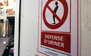 Panneau d'interdiction d'uriner.