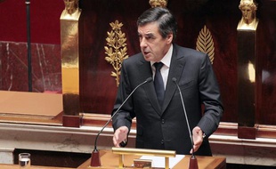 Le Premier ministre François Fillon s'exprime à l'Assemblée avant le débat et le vote sur l'intervention française en Libye, le 12 juillet 2011.