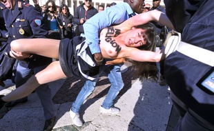 Femen activists protest in St.Peter's Square at the Vatican. The protest is against the Pope's planned visit at EU parliament as an attack on secularism. /AGFEDITORIAL_124001/Credit:Mimmo Chianura / AGF/SIPA/1411141246