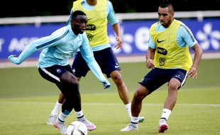 Paul-Georges Ntep, ici à l'entraînement à Clairefontaine avec Raphaël Varane et Dimitri Payet.