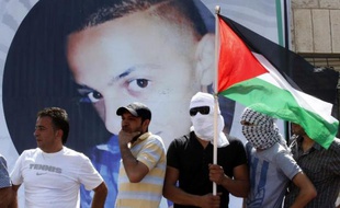 Des milliers d'habitants de Jérusalem-Est on tparticipé aux funérailles du jeune Palestinien Mohammed Abu Khder (portrait), 16 ans, assassiné apparemment en représailles au meurtre de trois Israéliens, le 4 juillet 2014
