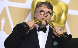 Guillermo del Toro, winner of the awards for best director for "The Shape of Water" and best picture for "The Shape of Water", poses in the press room at the Oscars on Sunday, March 4, 2018, at the Dolby Theatre in Los Angeles.
