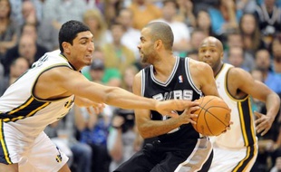 SALT LAKE CITY, UT - MAY 5: Enes Kanter #0 of the Utah Jazz reaches in on Tony Parker #9 of the San Antonio Spurs during the third quarter of Game Three of the Western Conference Quarterfinals in the 2012 NBA Playoffs at EnergySolutions Arena on May 05, 2012 in Salt Lake City, Utah. The Spurs won the game 102-90. NOTE TO USER: User expressly acknowledges and agrees that, by downloading and or using this photograph, User is consenting to the terms and conditions of the Getty Images License Agreement. Steve Dykes/Getty Images/AFP