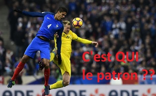 Raphaël Varane prend le dessus sur John Guidetti lors du match aller entre la France et la Suède (2-1), le 11 novembre 2016 au Stade de France.