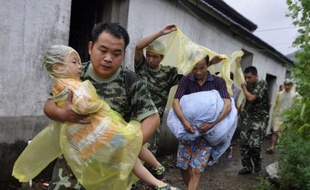 Un typhon a touché mercredi les régions orientales de la Chine, où plus d'un million de personnes avaient été évacuées par mesure de précaution, mais en perdant en intensité et en épargnant la capitale économique Shanghai, où les transports étaient toutefois perturbés.