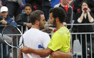 Laurent Lokoli félicite Steve Johnson, le 28 mai 2014 à Roland-Garros.