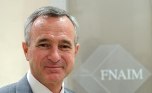 Le président de la FNAIM, Jean-François Buet, dans son bureau à Paris, le 30 octobre 2012