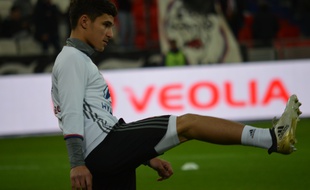 Houssem Aouar, ici lors de l'échauffement de l'OL avant la rencontre de Ligue 1 face à Nancy, le 8 février.