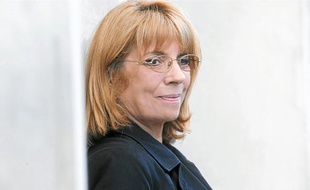 La première fois que Sylvie Jeanjacquot (en haut) a rencontré Jacques Mesrine (en bas), l'ennemi public numéro un était déguisé en ouvrier.