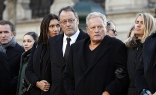 André Boudou, à côté de Jean Reno, lors des obsèques de Johnny Hallyday.