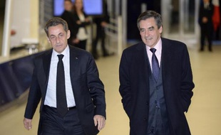 Nicolas Sarkozy et François Fillon au siège de l'UMP le 2 décembre 2014 à Paris