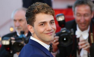Le jeune réalisateur canadien Xavier Dolan, auteur du film "Mommy" à son arrivée au palais des Festivals à Cannes pour la remise des prix du palmarés le 24 mai 2014