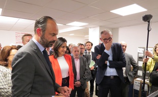 Le Premier ministre Edouard Philippe, aux côtés de la secrétaire d'Etat Brune Poirson, dans les locaux de Cdiscount ce mardi 4 juin.