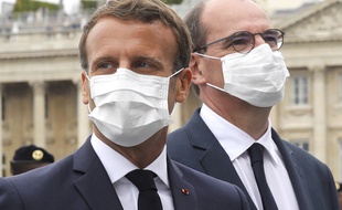 Emmanuel Macron et Jean Castex, masqués, lors des célébrations du 14 juillet 2020