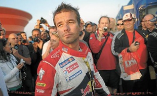 Sébastien Loeb et sa femme Séverine (derrière lui) participent au rallye Epernay-Vins de Champagne, ce week-end. (Archives)